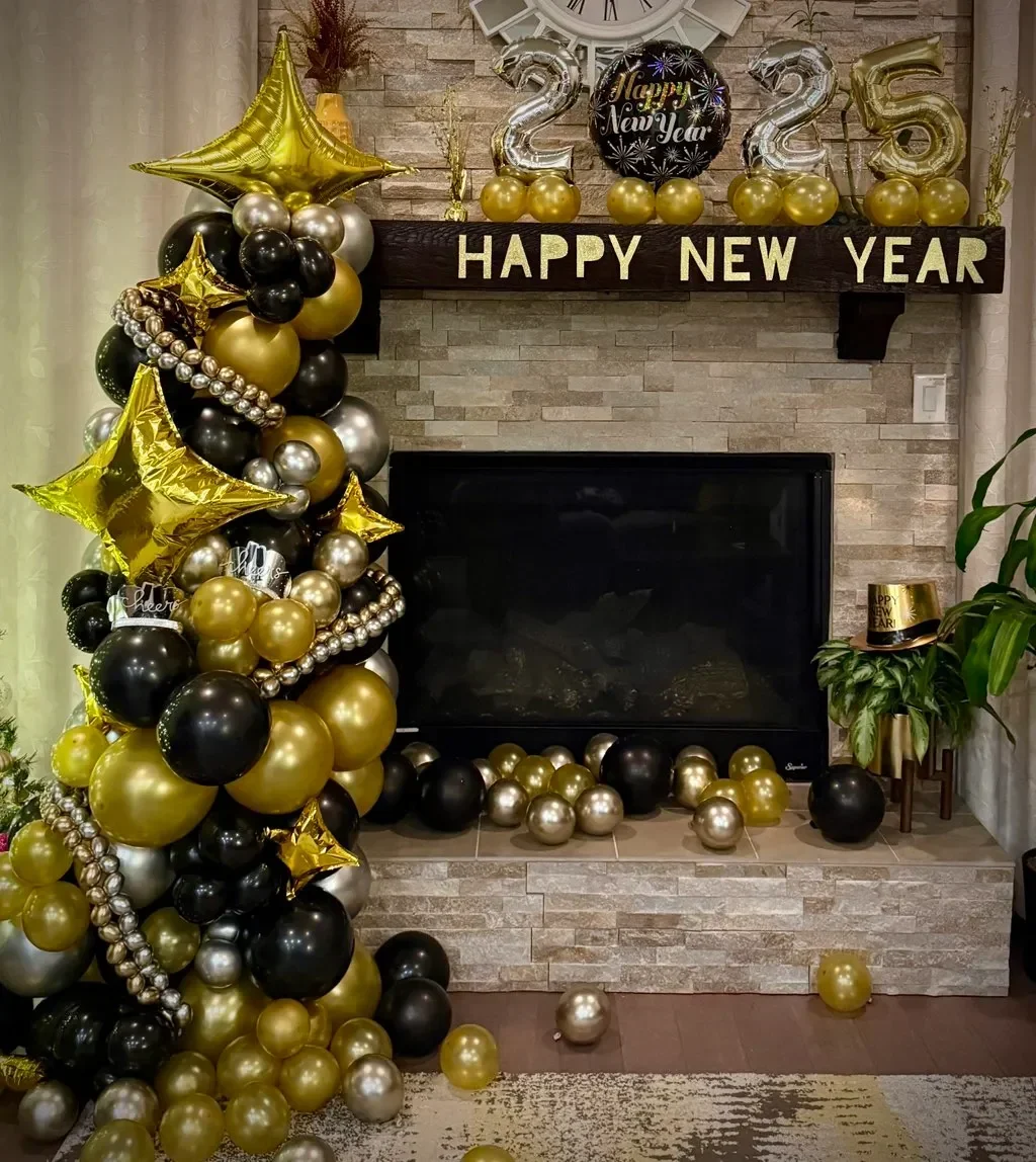 glamorous black and gold balloon stand for new years