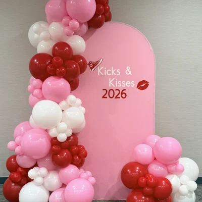 A cute Valentine's decor with red, pink & white balloons