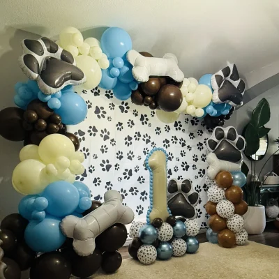 A Paw inspired backdrop for a one year old's birthday